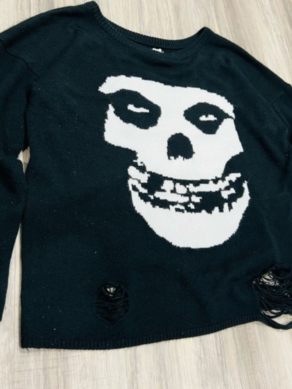 Black Crewneck Sweater with White Skull Graphic